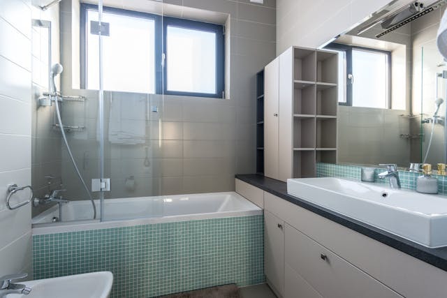 bathroom with large shelve units