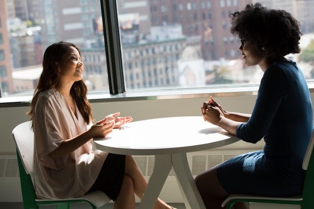 two people talking over a table (2)
