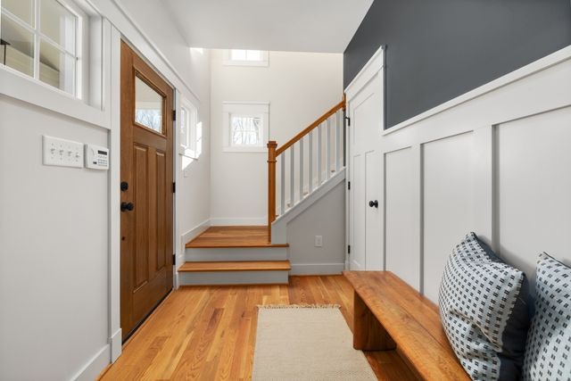 a door next to a set of stairs