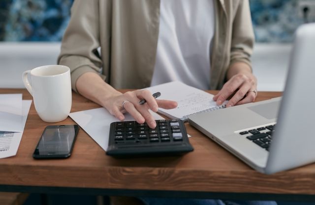 Property owner calculating property taxes