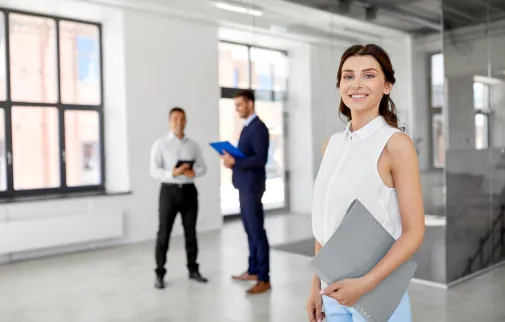 Photo of a woman holding a binder