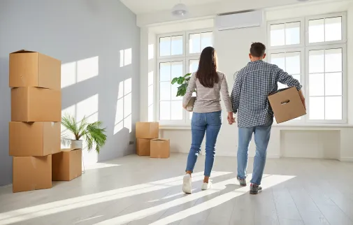 Photo of a couple moving in